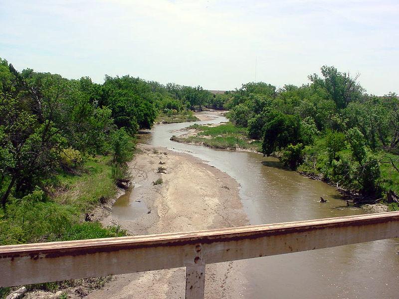 A B C Figure 9. Examples of streams classified as Transitional using the Parker (1976) methodology. (A) Smoky Hill River, KS; image from Wikimedia Commons, (B) Watts Branch, MD; image from bitplayer.