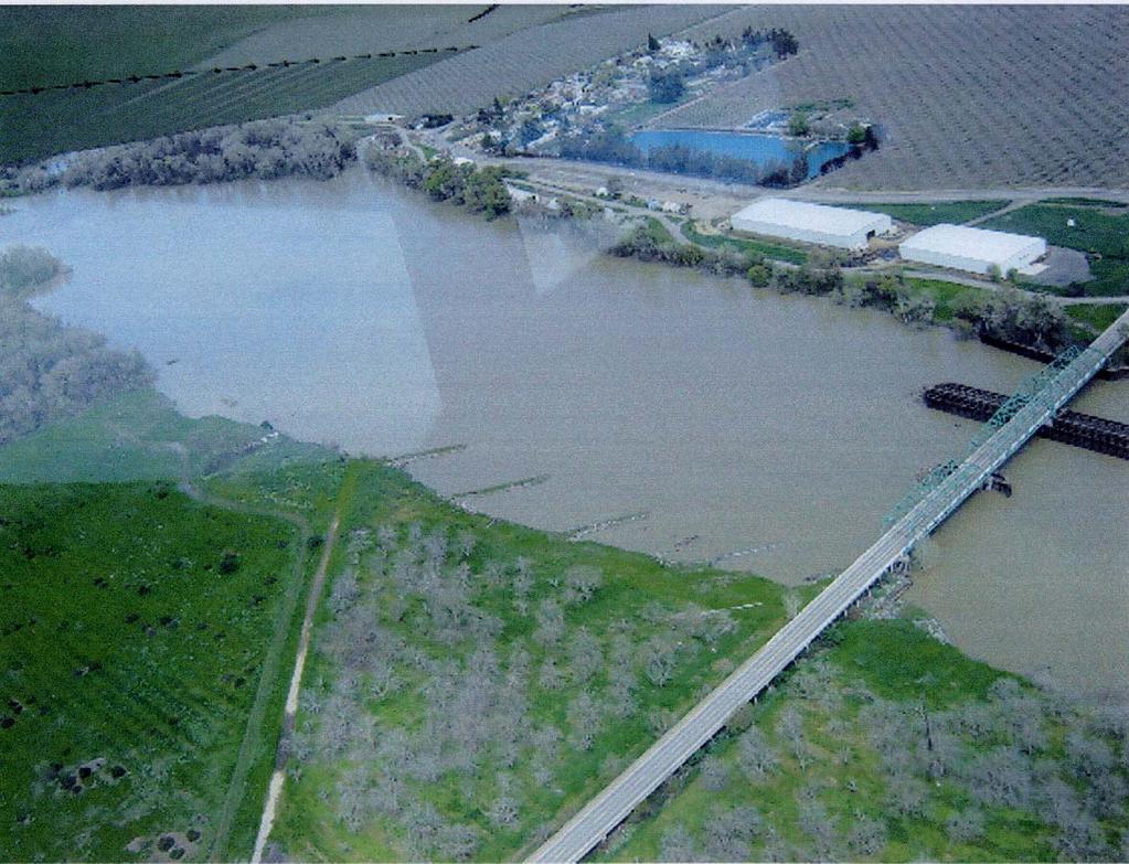This is a photo taken April 6, 2006, of the Butte City Bridge and State Highway 162. In 2004, CalTrans installed a series of four dikes upstream from the bridge on the west bank of the river.