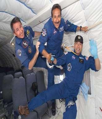 Weightlessness People aboard the space station appear to be weightless (They float around like there is no gravity).