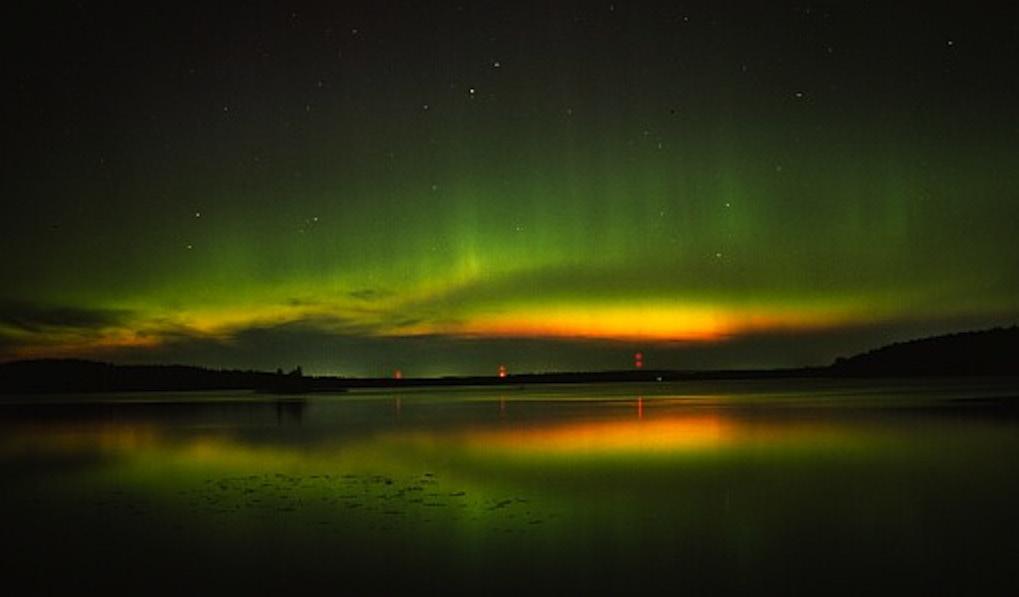 The more active the sun is, such as solar maximum, the more frequently discrete aurora occur.