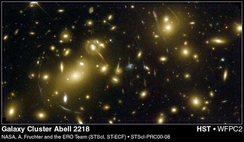 The phenomenon of gravitational lenses The phenomenon of gravitational lenses If we look carefully at the image taken with the Hubble Space Telescope, of the Galaxy Cluster Abell 2218 in the