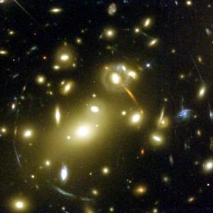 Gravitational lensing of distant galaxies as their
