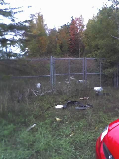 Figure 3: Example of unauthorized waste dumped outside WM property at the