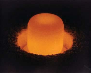 Pure plutonium-238 is prepared by irradiation of neptunium-237 that can be recovered from spent nuclear fuel during reprocessing, or by the irradiation of americium-237 in a reactor.