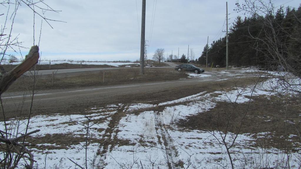 Figure 54: View, looking north from the location of the fence, showing the tire marks in the