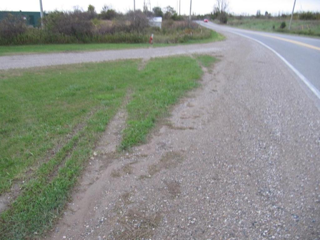 Figure 7: Tire marks in the grass of the east roadside show how the