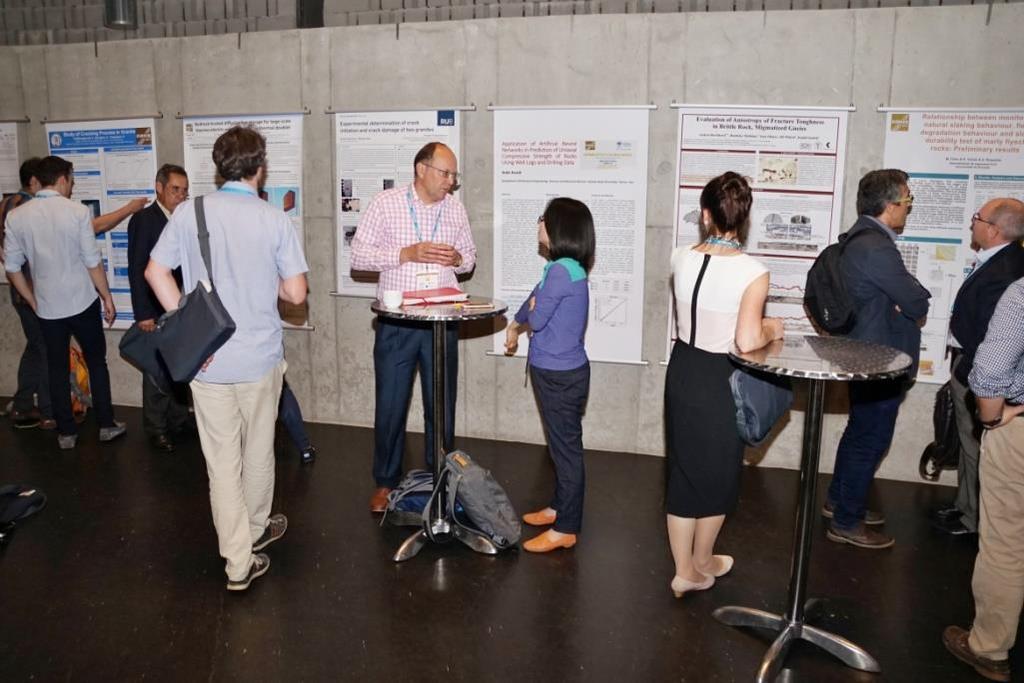 More phots are available on the following website: Participants during discussion in poster session https://www.zonerama.