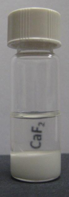 Figure S6. Extraction of the CaF 2 nanoparticles from a CHCl 3 dispersion (lower layer) to a sodium oleate aqueous solution (upper layer).