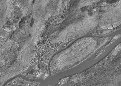 Small 1:2,000,000 Intermediate 1:100,000 Large 1:24,000 Figure 3. Image of a sample DOQ, which is raster based aerial photo that is georeferenced and has a constant scale across the photo. III.