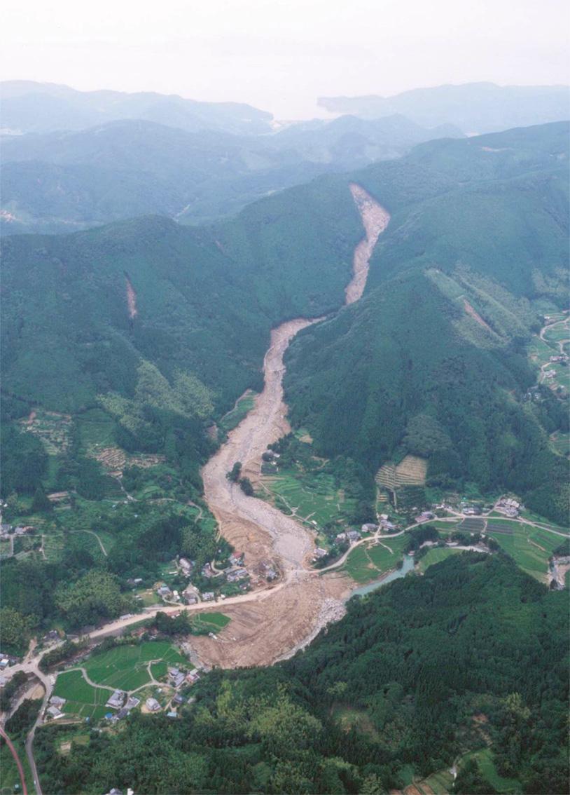 Monitoring, Simulation, Prevention and Remediation of Dense and Debris Flows 29 Photo 1: The debris flow disaster of the Atsumari River in Minamata City.