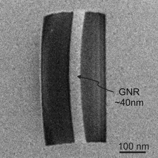 to the nanostructure above the bubble, as shown in Figure 2-8. Figure 2-8 HIM image of patterned graphene ribbon on SiO 2 /Si substrate with heavy incident helium ion dose and large exposure area.