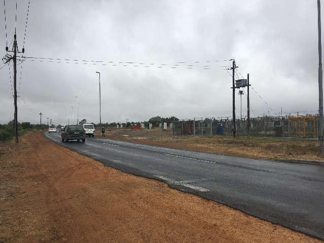 It has a surfaced shoulder on both sides. This road is running in a North-South direction linking Melkbosstrand Road (M19) on its southern end with Atlantis on its northern end.