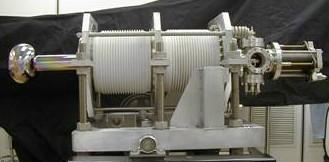 The FEL is driven by a 350 kv DC GaAs electron gun, the highest average current photoemission source to ever drive an FEL RGA, extractor gauge and