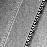 Waves in Saturn s rings This Voyager image captured a closeup of a pair of waves at the 5:3 resonance with the moon Mimas.