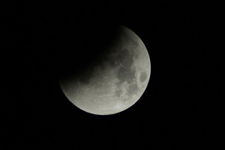 At about 02:36 on Monday morning the Moon will enter the outer part of Earth s shadow known as the penumbra. The first phase, when the Moon moves through the penumbra, will hardly be noticeable.