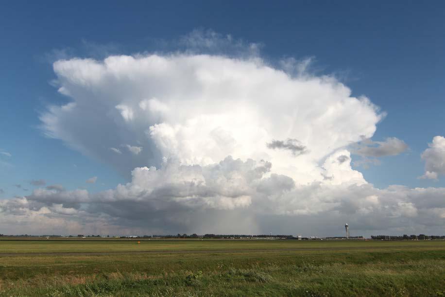and a developing TCu cloud immediately to the left). Fig. 68 A Dissipating Cumulonimbus (or Thunderstorm Cell).