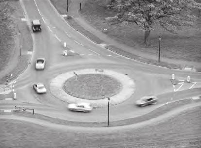 3 The photograph shows cars driving around a roundabout at a constant speed. The resultant force F on a car causes it to follow a circular path. Which of the following statements about F is incorrect?