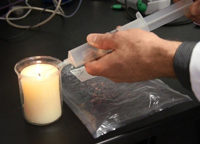 Formaldehyde in candle flame combustion products. Sample vapor products into prefilled Tedlar bag.