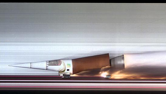 6. An experimental rocket sled on a level frictionless track has a mass of 1.4x10 4 kg. For propulsion, it expels gases from its rocket engines at a rate of 10 kg/s and at an exhaust speed of 2.