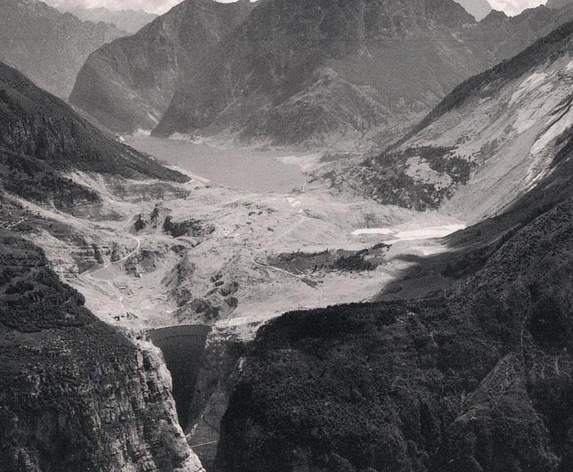 Figure 8.2 An image of the Vajont reservoir shortly after the massive landslide (landslide scar at right, dam located in foreground on the left). Source: Unknown (1963) copyright expired.