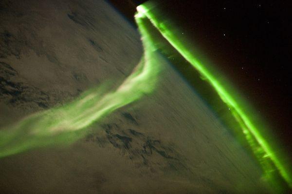 an aurora hovering over the