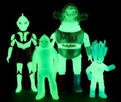 and see the object glow. It glows because the photons are being slowly released. Below is a photo of some phosphorescent toys.