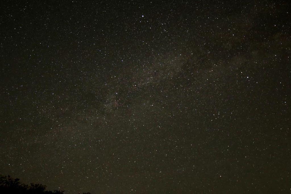Photo of the Month Attached is an image of the Spring Milky Way through the Summer Triangle. In this shot you'll find the Summer Triangle and its constituent constellations, centered on Cygnus.