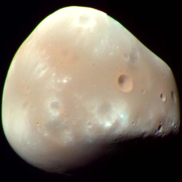 Mars moon Deimos is only 15 kilometers across but its surface is filled with craters and other interesting features.