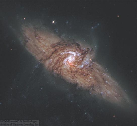 The Nature of Spiral Arms Chance coincidence of small spiral galaxy in front of a large