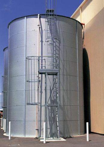 A city is planning to replace one of its water storage tanks with a larger one. The city s old tank is a right circular cylinder with a radius of 12 feet and a volume of 10,000 cubic feet.