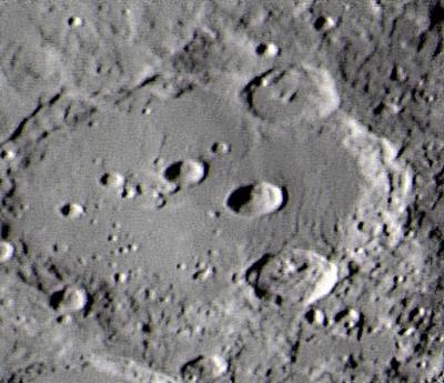 Earth s Moon Crater: A bowlshaped depression on the surface of a moon or a planet, usually caused by the impact of a meteorite.