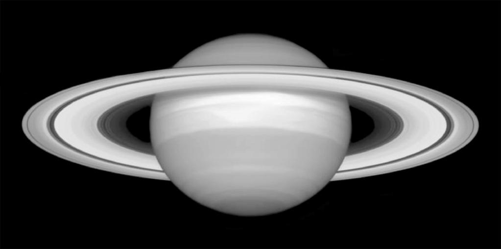 7. The photograph shows Saturn and its rings. Image courtesy of NASA (a) Describe the physical nature and composition of Saturn s rings.