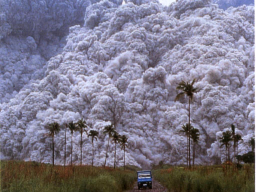 Pyroclastic Flow Gases and rock traveling down from the volcano due to gravity.