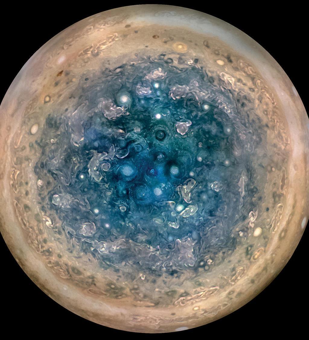 JUNO CAM This image shows Jupiter s south pole, as seen by NASA s Juno spacecraft from an altitude of 52,000 kilometers. The oval features are cyclones, up to 1,000 kilometers in diameter.