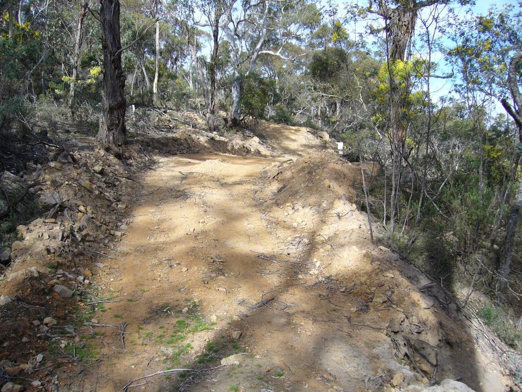 48 Fire trail on yellow brown clay loam, shale derived soils (class A) Recent substandard contractor repairs to trail Lack of relief drainage due to windrow along