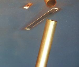 A jet of air issues from a long ( diameters) pipe with a o chamfer at its exit. The flow condition from such a nozzle is a hydro-dynamically fully developed turbulent jet with minimal entrainment.