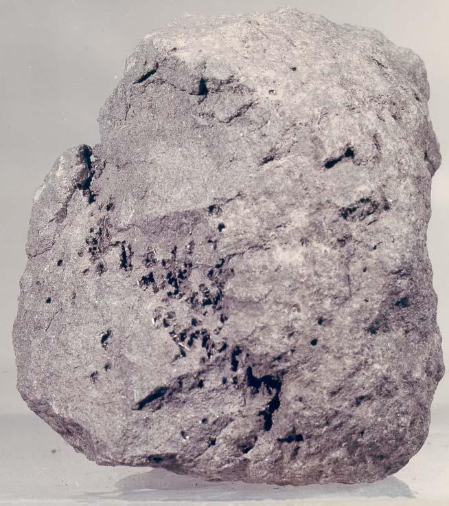 12052 Pigeonite Basalt 1866 grams Revised Figure 1: Photo of broken side of 12052 showing vugs. Sample is 6.5 cm high. NASA # S70-44633.